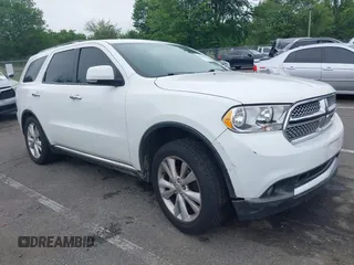 2013 Dodge Durango Crew with VIN 1C4RDJDG4DC518156, listed as a IAAI auction lot 42516880 with 162,402 mi miles and . Bid and sale history available at DreamBid. Image 1.