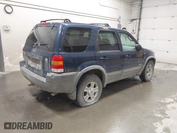 2002 Ford Escape XLT Choice z VIN 1FMCU04162KB99594, wystawiony jako IAAI lot #42632848 z przebiegiem 166 632 mil mil oraz . Historia ofert i sprzedaży dostępna na DreamBid. Obrazek 4.