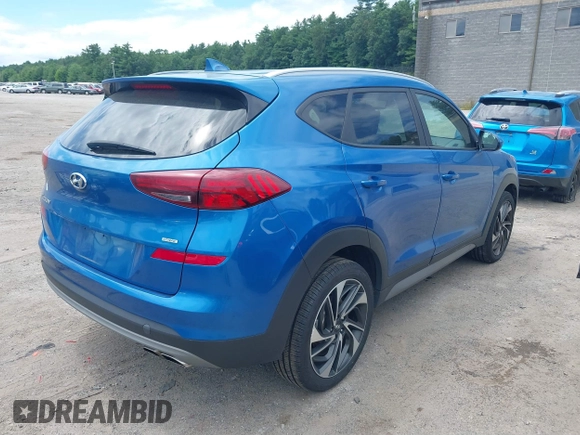 2019 Hyundai Tucson Ultimate with VIN KM8J3CAL3KU891754, listed as a IAAI auction lot 39809087 with 95,967 mi miles. Bid and sale history available at carsss.com. Image 4.