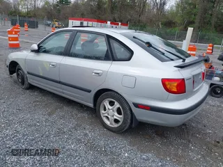2003 Hyundai Elantra GT z VIN KMHDN55D13U099447, wystawiony jako IAAI lot #41973749 z przebiegiem 200 923 mil mil oraz . Historia ofert i sprzedaży dostępna na DreamBid. Obrazek 3.