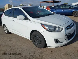2014 Hyundai Accent GS with VIN KMHCT5AE8EU155466, listed as a IAAI auction lot 41905867 with 129,178 mi miles. Bid and sale history available at carsss.com. Image 1.