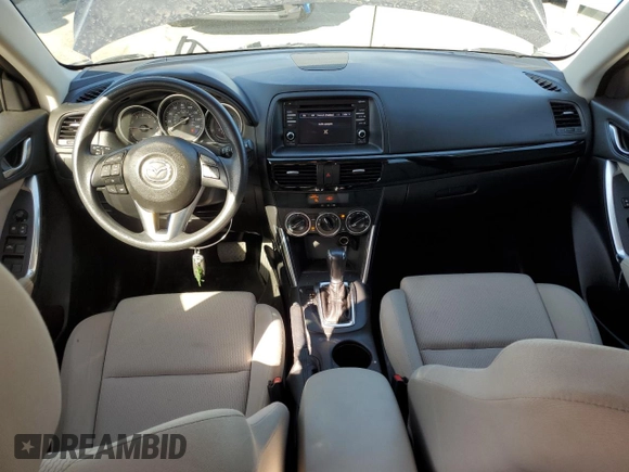 2015 Mazda CX-5 Sport with VIN JM3KE2BEXF0483141, listed as a Copart auction lot 59134105 with 71,727 mi miles and Salvage title. Bid and sale history available at DreamBid. Image 8.
