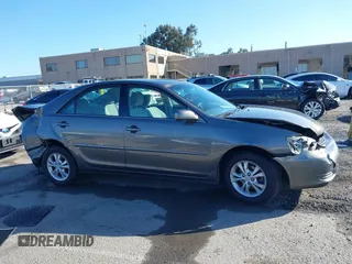 2004 Toyota Camry LE with VIN 4T1BF30K94U577260, listed as a IAAI auction lot 41906287 with 68,499 mi miles. Bid and sale history available at carsss.com. Image 14.