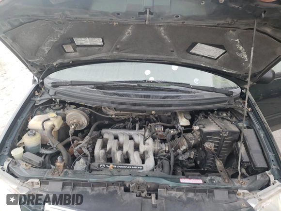 2000 Mazda MPV DX z VIN JM3LW28G8Y0106384, wystawiony jako Copart lot #66537813 z przebiegiem 223 272 mil mil oraz Szkoda całkowita • Salvage title. Historia ofert i sprzedaży dostępna na DreamBid. Obrazek 7.