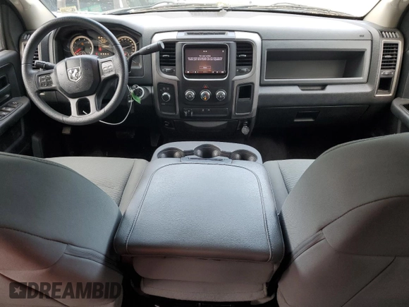 2014 Ram 1500 Express with VIN 3C6RR7KT4EG324804, listed as a Copart auction lot 58233005 with 103,306 mi miles and Salvage title. Bid and sale history available at DreamBid. Image 8.