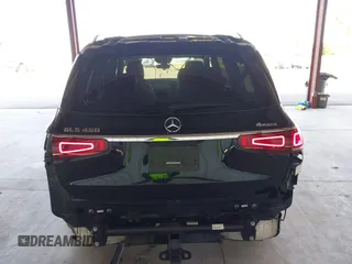 2021 Mercedes-Benz GLS 450 z VIN 4JGFF5KE5MA455372, wystawiony jako IAAI lot #42003413 z przebiegiem 73 909 mil mil oraz . Historia ofert i sprzedaży dostępna na DreamBid. Obrazek 17.