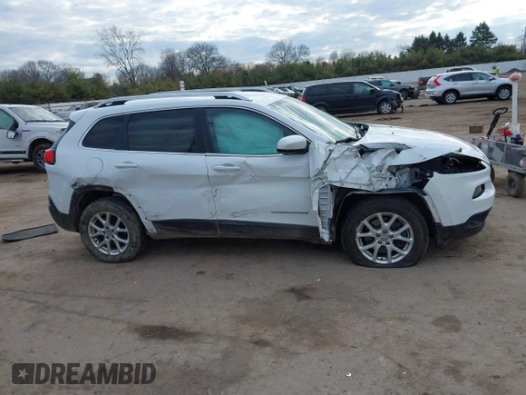 2015 Jeep Cherokee Latitude z VIN 1C4PJMCS9FW625521, wystawiony jako IAAI lot #41894602 z przebiegiem 112 865 mil mil oraz . Historia ofert i sprzedaży dostępna na DreamBid. Obrazek 13.