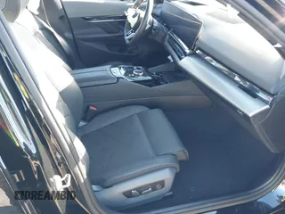2024 BMW i5 eDrive40 with VIN WBY33FK00RCP37858, listed as a IAAI auction lot 41016747 with Not provided miles and . Bid and sale history available at DreamBid. Image 5.