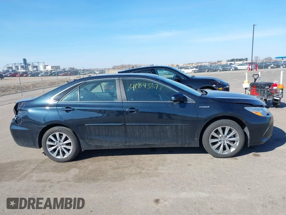 2015 Toyota Camry LE z VIN 4T1BD1FK8FU148065, wystawiony jako IAAI lot #41843278 z przebiegiem 91 137 mil mil oraz . Historia ofert i sprzedaży dostępna na DreamBid. Obrazek 13.