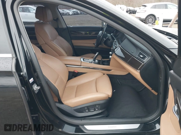 2011 BMW 7 Series 740i with VIN WBAKA4C55BC612584, listed as a IAAI auction lot 42021367 with 139,190 mi miles. Bid and sale history available at carsss.com. Image 5.