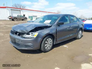 2014 Volkswagen Jetta Sedan S with VIN 3VW2K7AJ7EM422108, listed as a IAAI auction lot 41924347 with 76,584 mi miles. Bid and sale history available at carsss.com. Image 2.