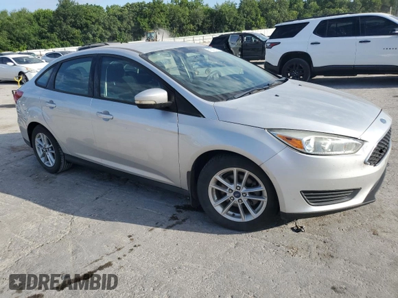 2015 Ford Focus SE with VIN 1FADP3F28FL234097, listed as a Copart auction lot 62660245 with 120,100 mi miles and Salvage title. Bid and sale history available at DreamBid. Image 4.