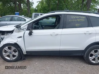 2013 Ford Escape SE z VIN 1FMCU0G95DUC11906, wystawiony jako IAAI lot #42367480 z przebiegiem 149 173 mil mil oraz . Historia ofert i sprzedaży dostępna na DreamBid. Obrazek 13.