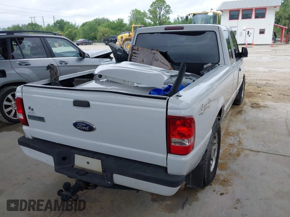 2011 Ford Ranger XLT z VIN 1FTLR4FE2BPA27434, wystawiony jako IAAI lot #42435809 z przebiegiem 172 439 mil mil oraz . Historia ofert i sprzedaży dostępna na DreamBid. Obrazek 4.