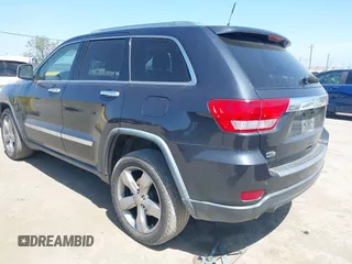 2013 Jeep Grand Cherokee Overland with VIN 1C4RJECT8DC534021, listed as a IAAI auction lot 42058374 with 137,289 mi miles. Bid and sale history available at carsss.com. Image 3.