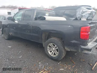 2014 Chevrolet Silverado 1500 LT with VIN 1GCRCRECXEZ297304, listed as a IAAI auction lot 40954344 with 185,323 mi miles. Bid and sale history available at carsss.com. Image 3.