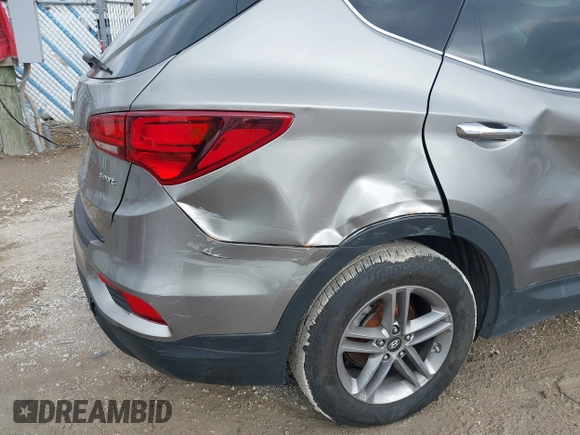 2017 Hyundai Santa Fe 2.4L with VIN 5XYZU3LB4HG424734, listed as a IAAI auction lot 41491166 with 130,905 mi miles and . Bid and sale history available at DreamBid. Image 6.