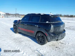 2011 MINI Countryman S with VIN WMWZC5C50BWL55234, listed as a IAAI auction lot 41323339 with 134,709 mi miles and . Bid and sale history available at DreamBid. Image 3.