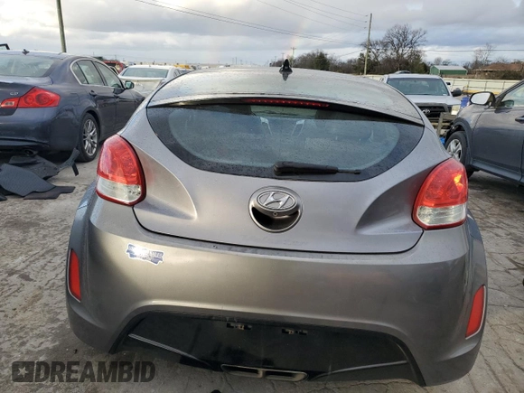 2014 Hyundai Veloster RE:FLEX z VIN KMHTC6AD2EU216453, wystawiony jako Copart lot #87090324 z przebiegiem 147 771 mil mil oraz Czysty tytuł • Clean title. Historia ofert i sprzedaży dostępna na DreamBid. Obrazek 6.