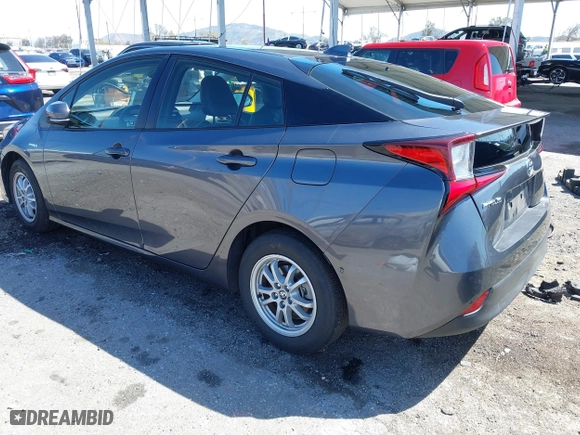 2022 Toyota Prius L Eco with VIN JTDKAMFU2N3172026, listed as a IAAI auction lot 41841090 with 49,011 mi miles. Bid and sale history available at carsss.com. Image 3.