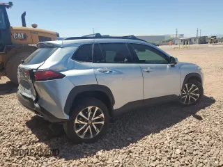 2023 Toyota Corolla Cross XLE with VIN 7MUDAAAG2PV050945, listed as a Copart auction lot 62237465 with 33,036 mi miles and Salvage title. Bid and sale history available at DreamBid. Image 3.