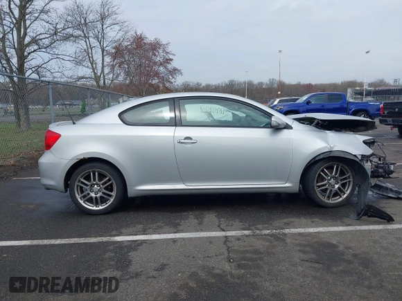 2005 Scion tC with VIN JTKDE177150001329, listed as a IAAI auction lot 41952901 with 143,223 mi miles. Bid and sale history available at carsss.com. Image 13.