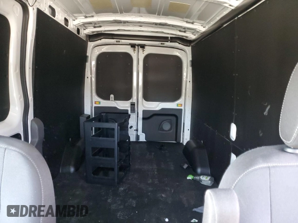 2023 Ford E-Transit Cargo z VIN 1FTBW9CK1PKB93878, wystawiony jako Copart lot #82899604 z przebiegiem 6009 mil mil oraz Szkody całkowita. Historia ofert i sprzedaży dostępna na DreamBid. Obrazek 10.