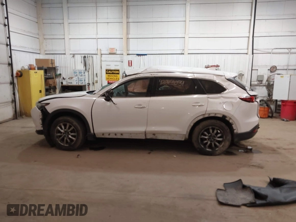 2016 Mazda CX-9 Touring with VIN JM3TCBCY3G0114707, listed as a IAAI auction lot 42023034 with 225,281 mi miles and . Bid and sale history available at DreamBid. Image 14.