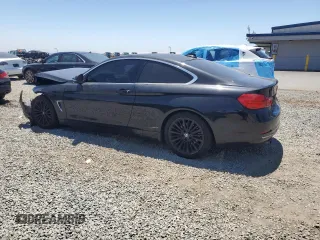 2014 BMW 4 Series 428i with VIN WBA3N3C57EF712370, listed as a Copart auction lot 63108215 with 151,779 mi miles and Salvage title. Bid and sale history available at DreamBid. Image 2.