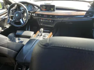 2014 BMW X5 xDrive35d z VIN 5UXKS4C51E0J96683, wystawiony jako Copart lot #55558625 z przebiegiem 119 720 mil mil oraz Szkoda całkowita • Salvage title. Historia ofert i sprzedaży dostępna na DreamBid. Obrazek 8.