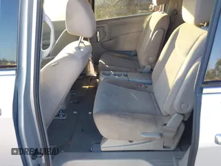2017 Nissan Quest SV with VIN JN8AE2KP6H9169849, listed as a IAAI auction lot 41565284 with 154,656 mi miles. Bid and sale history available at carsss.com. Image 8.
