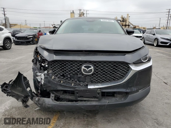 2025 Mazda CX-30 S with VIN 3MVDMBAMXSM778811, listed as a Copart auction lot 54241865 with 8,822 mi miles and Salvage title. Bid and sale history available at DreamBid. Image 5.