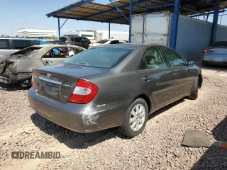 2004 Toyota Camry LE with VIN 4T1BF30K24U569209, listed as a Copart auction lot 66181644 with 186,412 mi miles and Salvage Title. Bid and sale history available at carsss.com. Image 3.