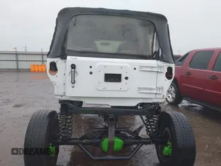 2013 Jeep Wrangler Sport with VIN 1C4AJWAG8DL601399, listed as a IAAI auction lot 42186399 with 130,195 mi miles and . Bid and sale history available at DreamBid. Image 17.