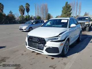 2018 Audi Q3 Premium Plus with VIN WA1JCCFS0JR023467, listed as a IAAI auction lot 41338155 with 58651 miles. Bid and sale history available at carsss.com. Image 17.