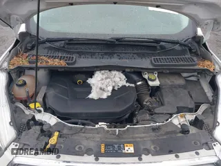 2017 Ford Escape SE z VIN 1FMCU9G95HUA24739, wystawiony jako IAAI lot #41880800 z przebiegiem 164 285 mil mil oraz . Historia ofert i sprzedaży dostępna na DreamBid. Obrazek 10.
