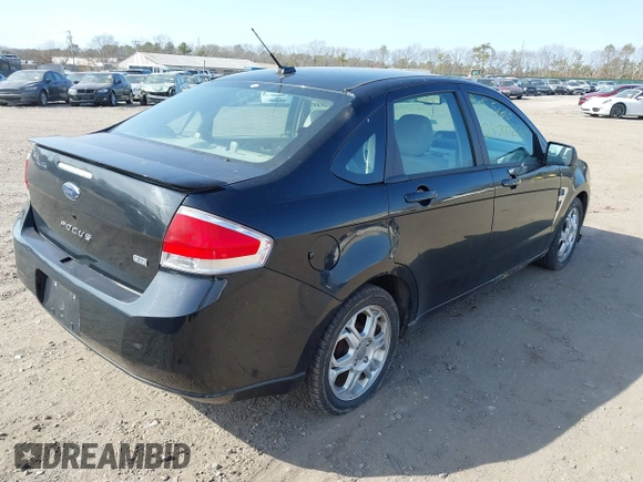 2008 Ford Focus SE with VIN 1FAHP35N68W278579, listed as a IAAI auction lot 41801538 with 999,999 mi miles. Bid and sale history available at carsss.com. Image 4.