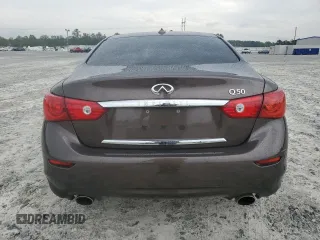 2015 Infiniti Q50 Premium z VIN JN1BV7AP5FM353448, wystawiony jako Copart lot #57115325 z przebiegiem 104 721 mil mil oraz Szkoda całkowita • Salvage title. Historia ofert i sprzedaży dostępna na DreamBid. Obrazek 6.