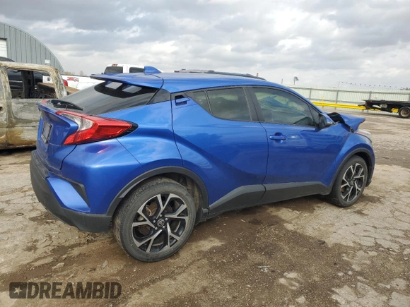 2021 Toyota C-HR LE with VIN JTNKHMBX2M1107890, listed as a Copart auction lot 77992554 with 54,219 mi miles and Salvage Title. Bid and sale history available at carsss.com. Image 3.