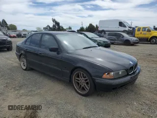 2000 BMW 5 Series z VIN WBADM5341YBY17346, wystawiony jako Copart lot #52618955 z przebiegiem 268 792 mil mil oraz Szkoda całkowita • Salvage title. Historia ofert i sprzedaży dostępna na DreamBid. Obrazek 4.