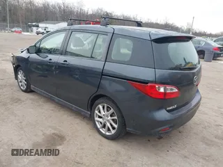 2012 Mazda 5 Touring with VIN JM1CW2CL6C0107233, listed as a IAAI auction lot 41332199 with 130,428 mi miles and . Bid and sale history available at DreamBid. Image 3.