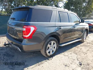 2019 Ford Expedition XLT with VIN 1FMJU1HT5KEA76330, listed as a IAAI auction lot 41171664 with 89,548 mi miles. Bid and sale history available at carsss.com. Image 4.