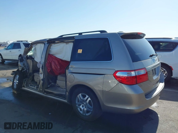 2005 Honda Odyssey EX-L with VIN 5FNRL38755B063203, listed as a IAAI auction lot 41073372 with Not provided miles and . Bid and sale history available at DreamBid. Image 3.