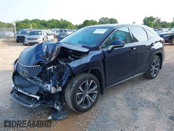 2022 Lexus RX 350 with VIN 2T2HZMAA5NC232352, listed as a IAAI auction lot 42399381 with 13,359 mi miles and . Bid and sale history available at DreamBid. Image 2.
