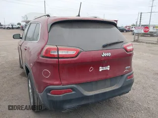 2016 Jeep Cherokee Latitude with VIN 1C4PJLCS1GW247965, listed as a IAAI auction lot 41623805 with 114,187 mi miles. Bid and sale history available at carsss.com. Image 3.