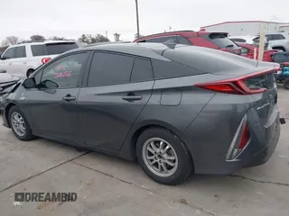 2018 Toyota Prius Plus with VIN JTDKARFPXJ3087064, listed as a IAAI auction lot 41433495 with 118,298 mi miles and . Bid and sale history available at DreamBid. Image 14.