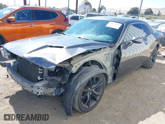 2017 Dodge Challenger R/T Plus with VIN 2C3CDZBT8HH600032, listed as a IAAI auction lot 42173591 with 92,303 mi miles and . Bid and sale history available at DreamBid. Image 2.