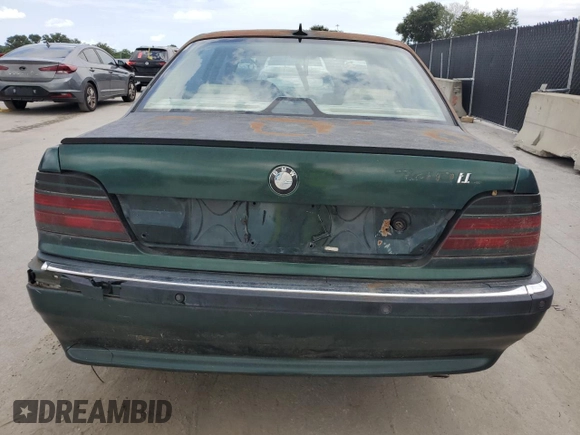 1996 BMW 7 Series 740iL z VIN WBAGJ8326TDL35670, wystawiony jako Copart lot #60806225 z przebiegiem 123 458 mil mil oraz Czysty tytuł • Clean title. Historia ofert i sprzedaży dostępna na DreamBid. Obrazek 6.