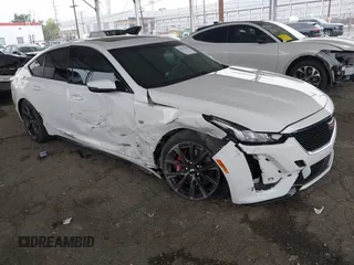 2021 Cadillac CT5 Sport z VIN 1G6DU5RK9M0117981, wystawiony jako IAAI lot #42021432 z przebiegiem 67 363 mil mil oraz . Historia ofert i sprzedaży dostępna na DreamBid. Obrazek 1.