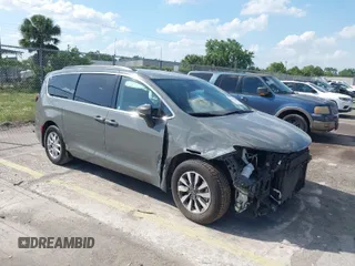 2022 Chrysler Pacifica Touring L z VIN 2C4RC1BG9NR157831, wystawiony jako IAAI lot #41924441 z przebiegiem 82 223 mil mil oraz . Historia ofert i sprzedaży dostępna na DreamBid. Obrazek 1.